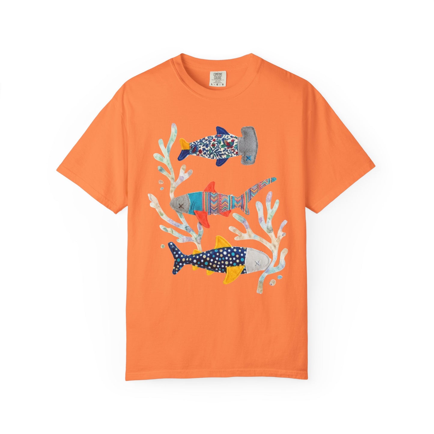 Faux patterned sharks graphic tee in Melon showing the full faux patterned shark trio illustration — color mockup