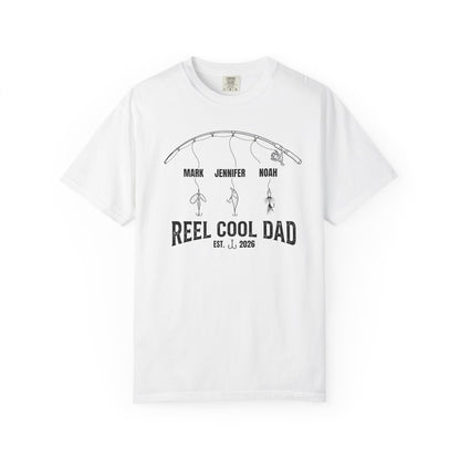 White t-shirt with fishing graphic reel cool dad  and text on a white background