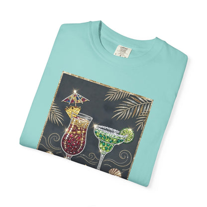 Folded chalky mint t-shirt with gemstone cocktail design on a white background