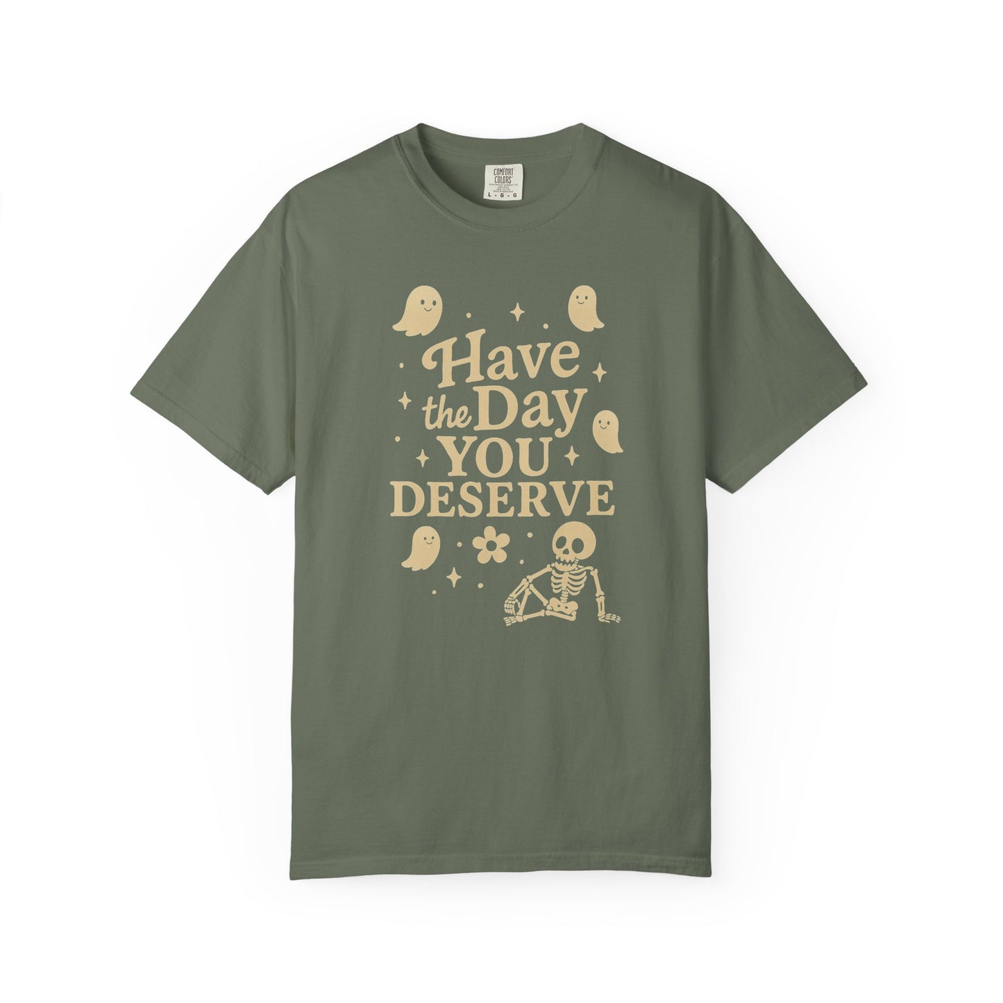 moss t-shirt with Halloween-themed design and text that says "have the day you deserve" on a white background