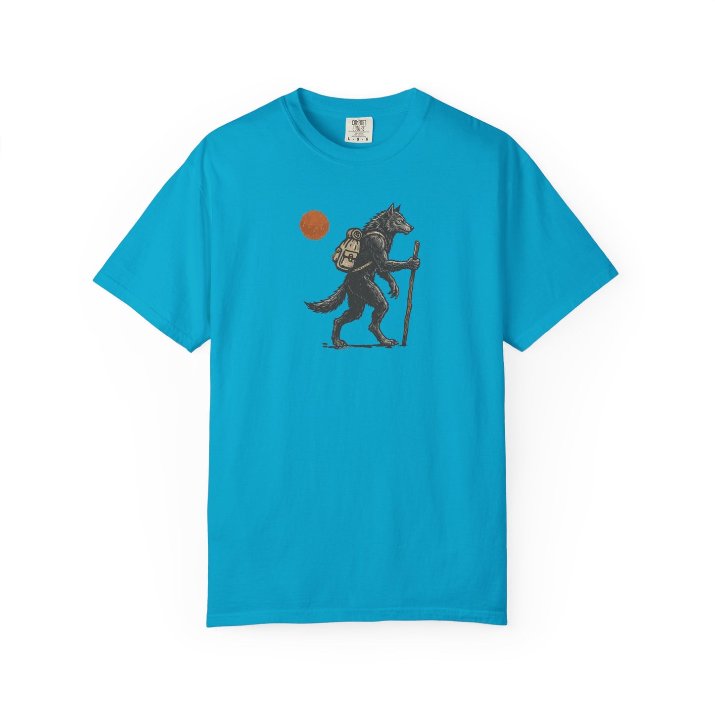 Hiking Wolf graphic t-shirt in Sapphire — werewolf with backpack and walking stick print on garment-dyed heavyweight cotton tee.