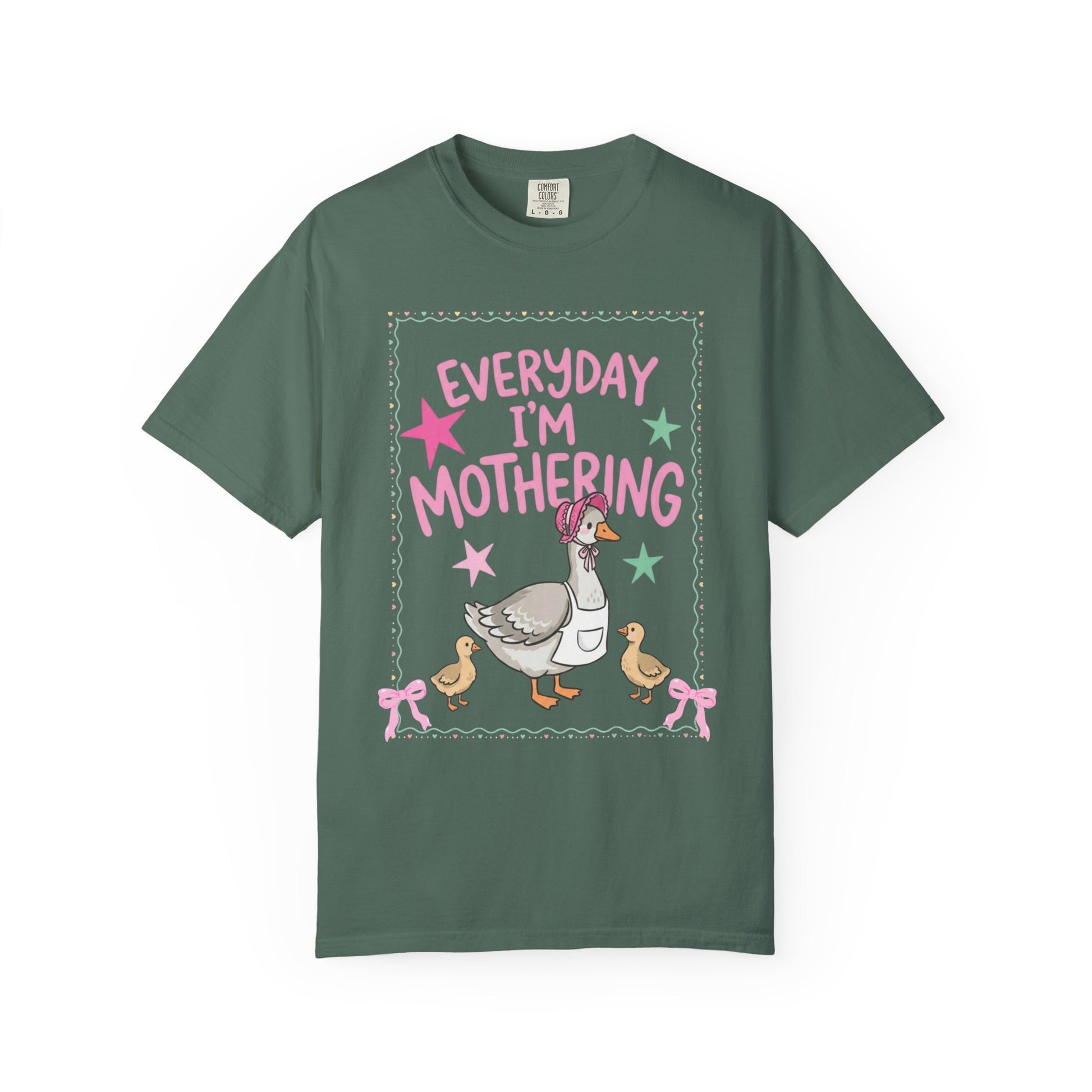 bruce spruce t-shirts with front and back graphic designs of a mother goose her ducklings with phrase "everyday im mothering" and text on a white background