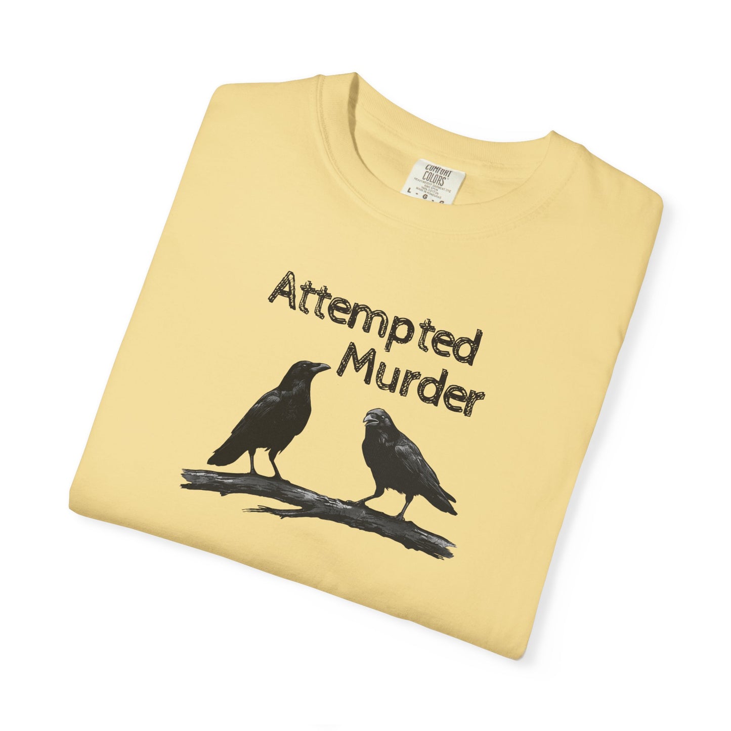Butter garment-dyed unisex crow graphic tee — Attempted Murder dark humor bird pun shirt
