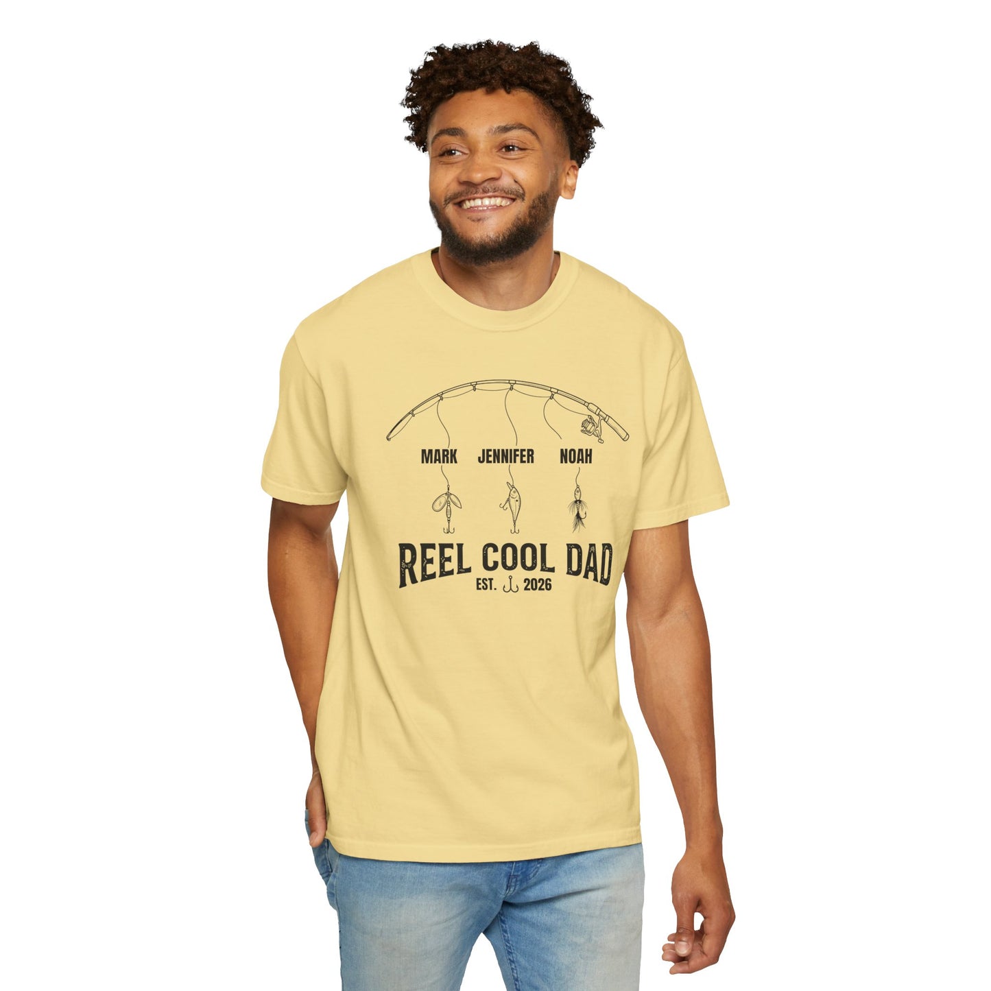 Man wearing a yellow t-shirt with 'Reel Cool Dad' design on a white background