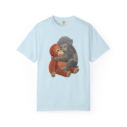 chambray t-shirt with monkey and baby design on a white background