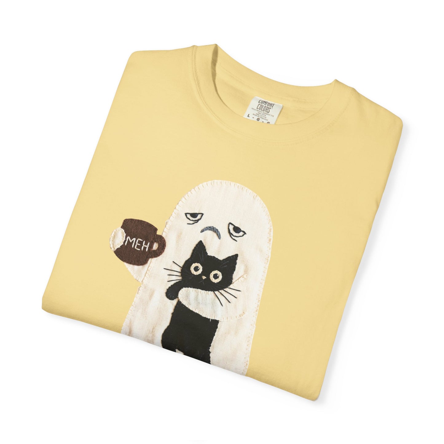 Grumpy ghost holding MEH mug with black cat graphic on Butter Comfort Colors garment-dyed tee