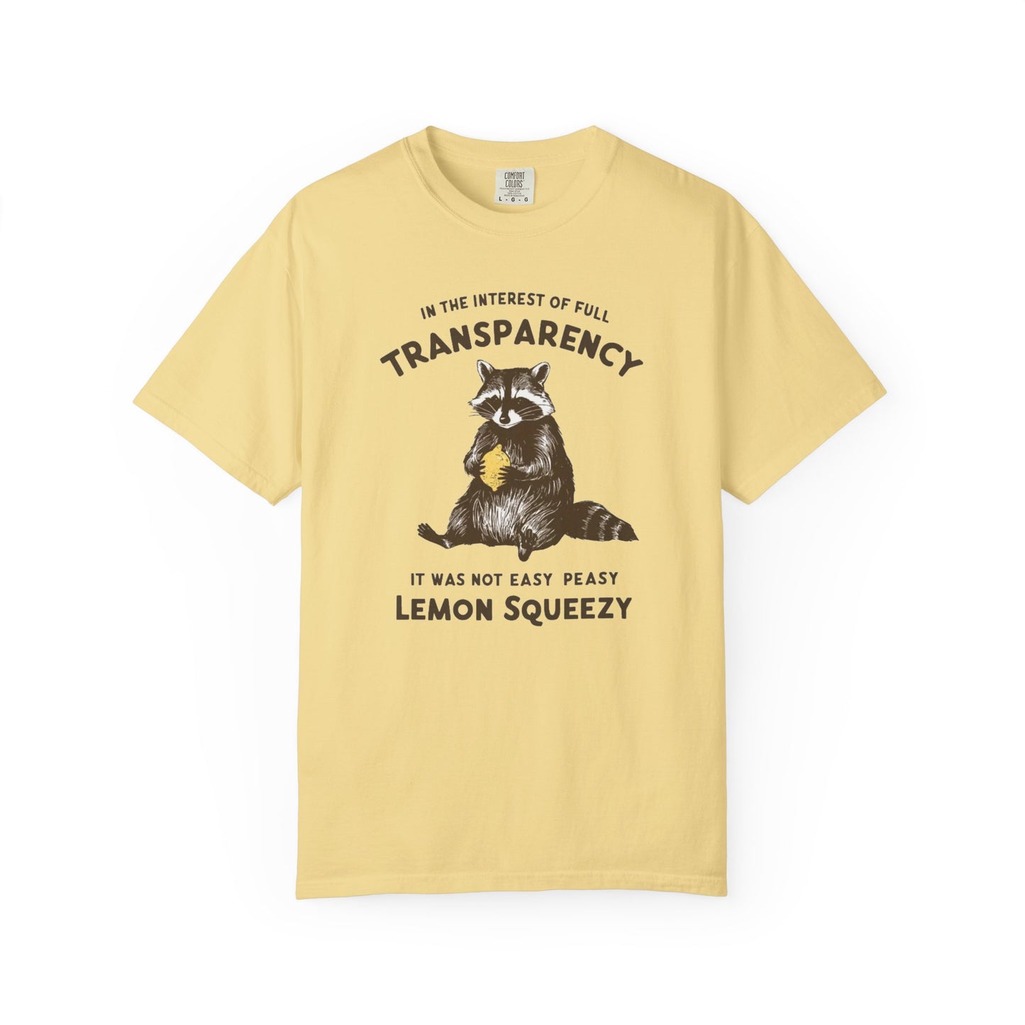 Funny raccoon sarcastic meme t-shirt in Butter — "Was Not Easy Peasy Lemon Squeezy" graphic tee