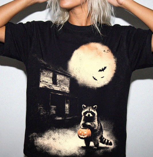 Halloween raccoon trick-or-treat graphic tee in black — garment-dyed Comfort Colors 1717 heavyweight shirt