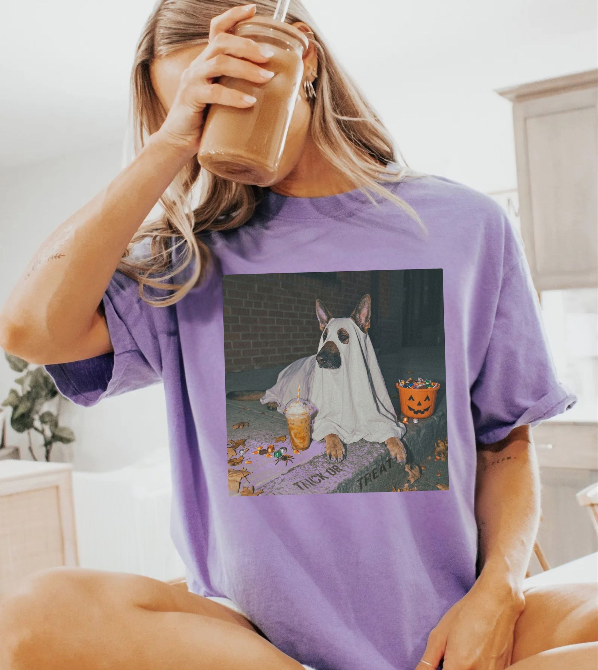 Violet garment-dyed t-shirt with German Shepherd in ghost costume jack-o'-lantern treat bucket — Halloween ghost dog tee by GodaStudio